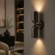 5lamp Capsule Platin çift yönlü aplik, modern yaşam alanında sıcak ışık etkisiyle