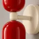 5lamp Capsule Kırmızı Krem aplikte parlak kırmızı gövde, krem bağlantı ve rozet detayı