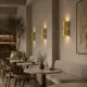 Kafe duvarında sıralı kullanılan 5lamp Capsule Sarı Krem çift yönlü metal duvar aplikleri