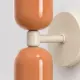 5lamp Capsule Somon Krem aplikte parlak somon gövde, krem bağlantı parçası ve yuvarlak rozet detayı