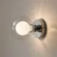5lamp Sakız Natural şeffaf cam duvar apliğinin açık hâlde duvarda oluşturduğu dekoratif ışık yansımaları